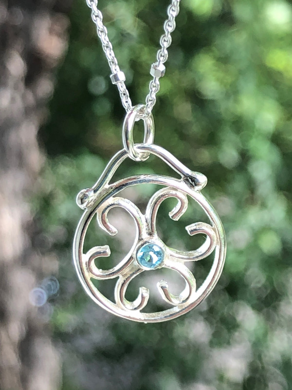 Sterling Silver 16mm Circle with 3mm faceted Aquamarine.  Family, Friendship, Faith