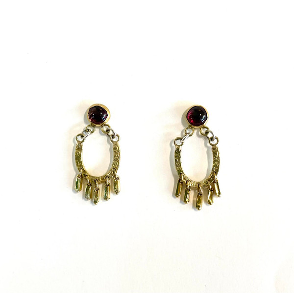 18k and 14k ancient style spangled earrings with garnets. (2 teeny silver rings on ea.) I deliberately made the bezels around the stones uneven to add to the romantic, ancient look. Lovely worn with anything from denim to velvet! approx 1 - 1 1/8 in. Designed and hand fabricated by, J A Lindberg.