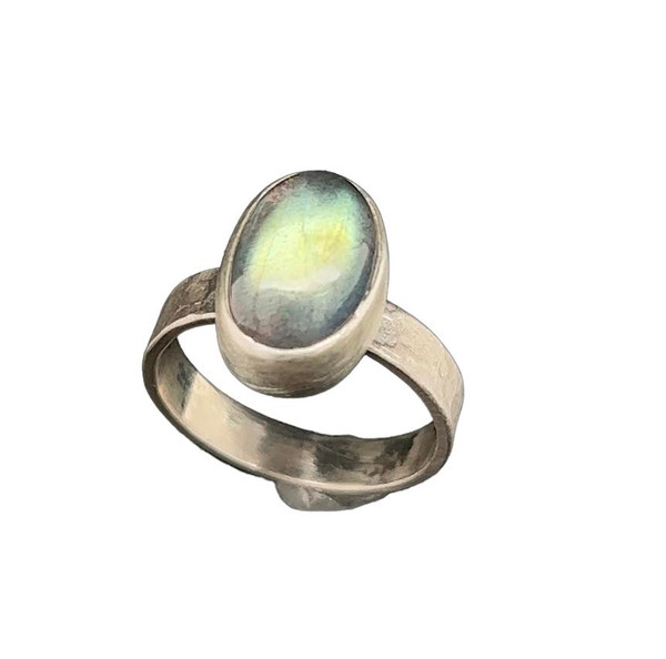 Gem Labradorite Ring. This is the highest quality labradorite you can get and almost looks like a moonstone. I cut this high dome stone from a deposit in Madagascar. Made with fine silver bezel and sterling textured band in a size 6.5