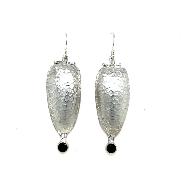 Hollow formed Earrings with Garnets. I used a hydraulic press to custom 3-D form these unique earrings in sterling silver set with 2 garnets. Since they are hollow they are very lightweight.