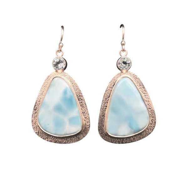 Larimar Earrings and Blue Topaz.
I cut these high-quality matching pair of Larimar using a butterfly technique where the stones are mirror images of each other. This stone comes from the Dominican Republic and is paired with Brazilian blue Topaz accents in fine silver and sterling silver components.