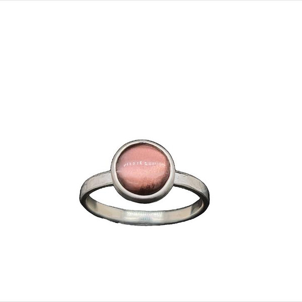 Sunstone Stackable Ring. I cut this extremely bright sunstone from a mine in Oregon. It is completely natural and has an effect called ‘Shiller’ which is the reflection of thousands of microscopic platelets of copper in the stone. The inclusions create this rare optical effect. Super cool at 9mm. Set in fine silver with sterling band sized 6.5
