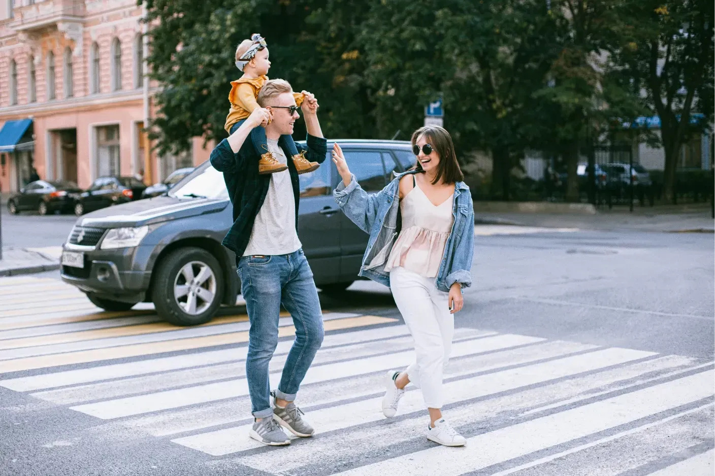 A Photo Of A Family Walking In Pedestrian Lane