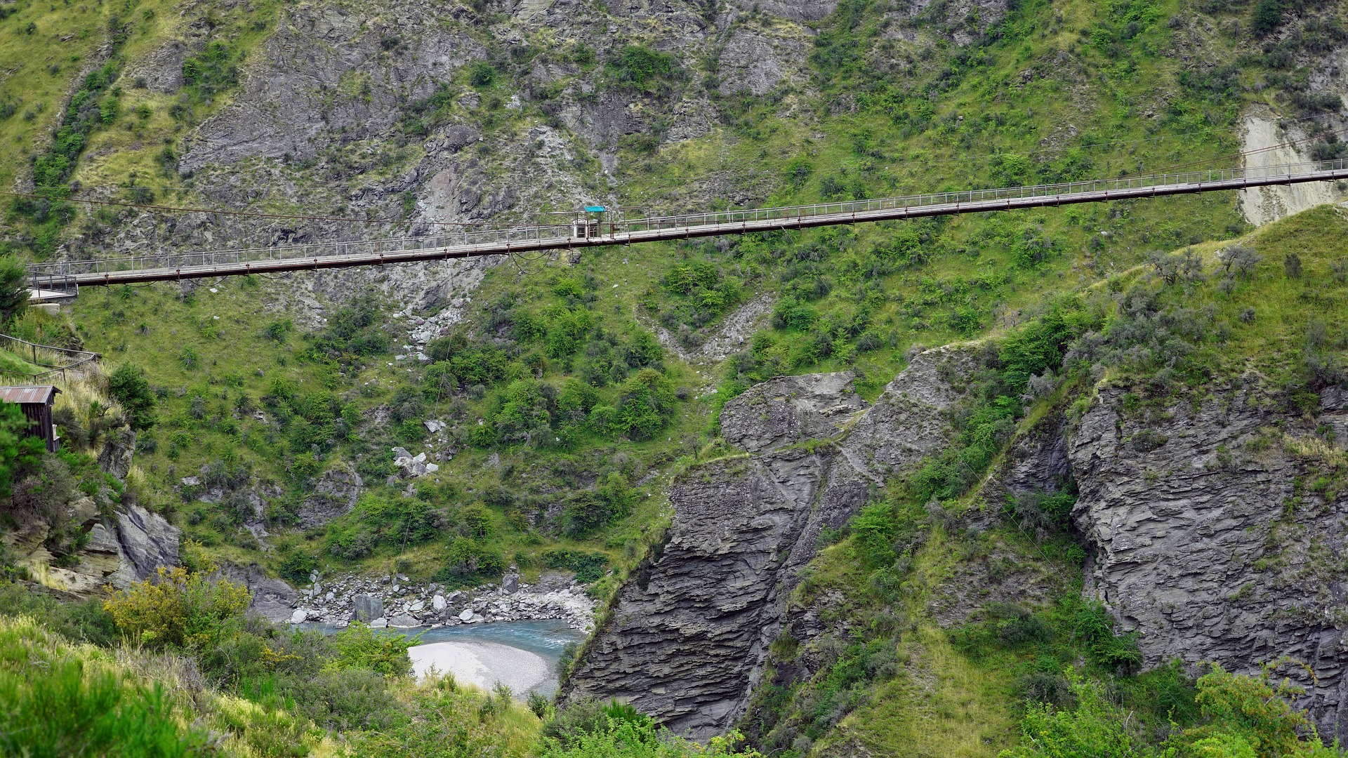 Car driving across bridge in skippers canyon