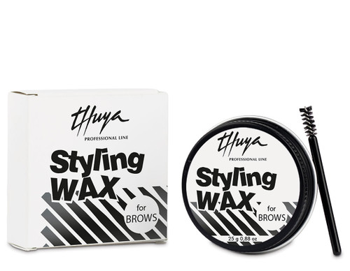 Thuya styling wax in a black tin and white packaging with a black brow brush on a white background