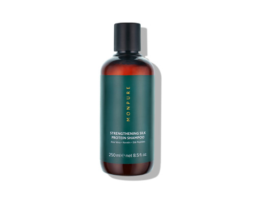 Monpure strengthening silk protein shampoo in a 250ml bottle with a green label and a black cap.