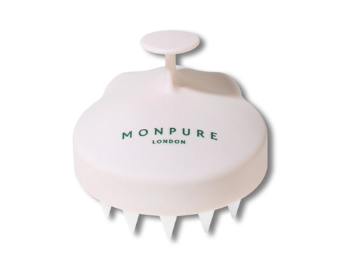 Monpure scalp massager in white with Monpure branding.