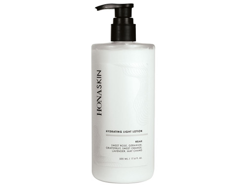 HONA SKIN hydrating light lotion in a 500ml bottle with a black dispenser in the scent, relax.