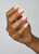 Hand with The GelBottle Inc BIAB™ builder gel on the nails in the shade, Bunny.