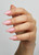Hand with The GelBottle Inc All-in-One BIAB™ on the nails in the shade, NU08.