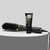 ghd duet blowdry brush and ghd blowdry cream on a grey table.