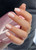 Hand with The GelBottle Inc BIAB hard gel on the nails in the shade, Dreamer.