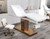 Esthetix Aria electric beauty bed, white/gold in a clinic