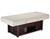 Pro Salon beauty bed with a cushioned white top and a dark brown wooden base with storage.