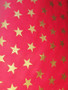 red cotton with gold stars cotton fabric