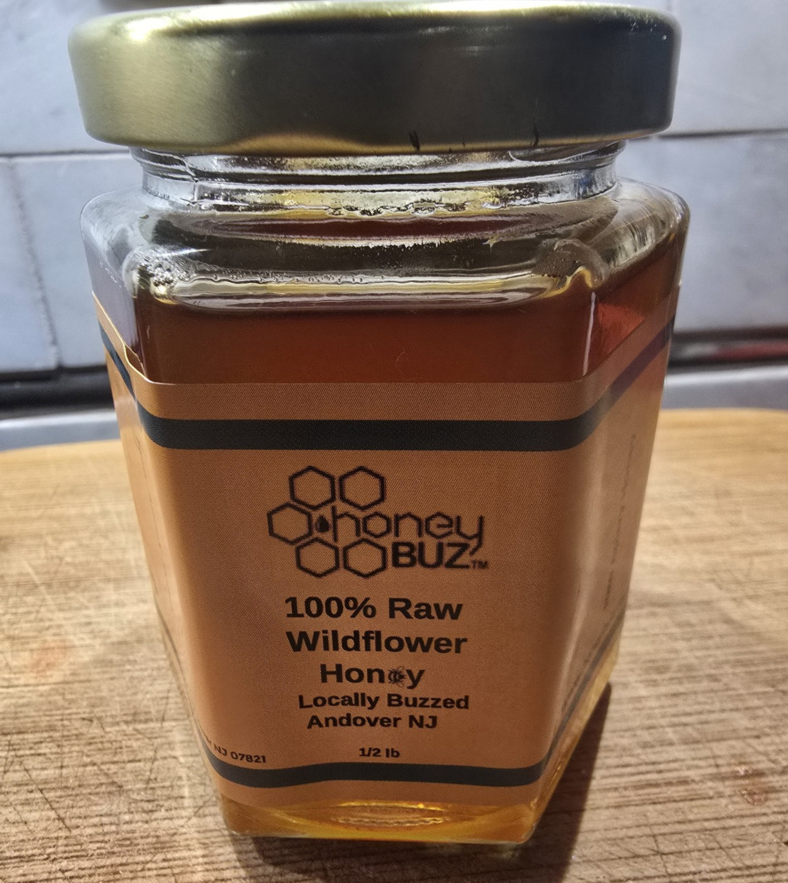 Honey Buz Apiary Honey this is  Raw from the frame -hand spun
   1/2 pound size