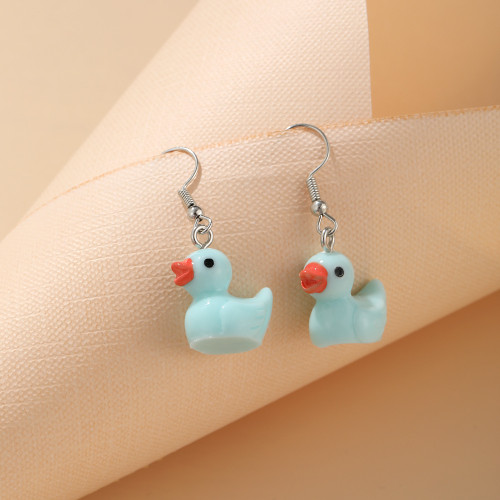 mint blue duck earrings on hook