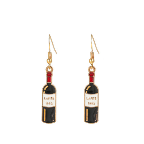 Bottle of red wine earrings hanging from hook