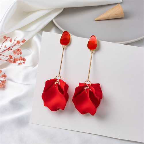 long earrings with bright red petals hung from gold coloured rod beneath an acrylic stud on s925 posts