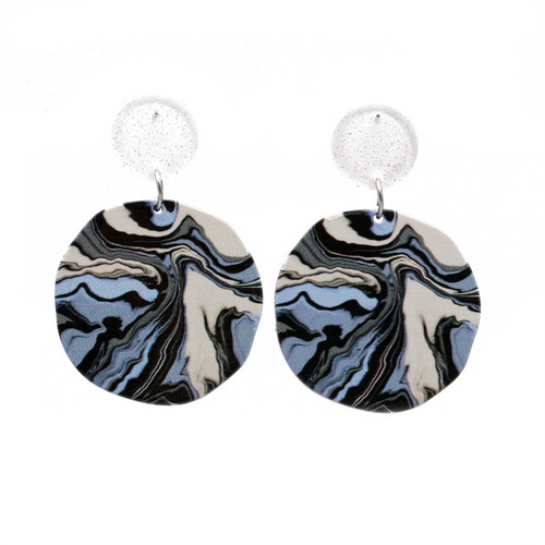 round geometric shape acrylic earring hung from round stud on posts - blue, black and cream