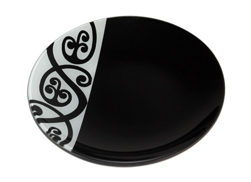 Round glass plate with Maori design (measures approx 11.5" across)