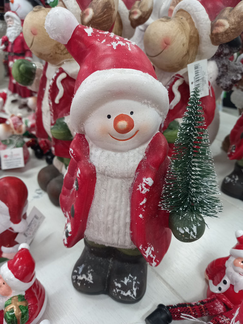 25cm tall Snowman figurine holding a small Christmas Tree