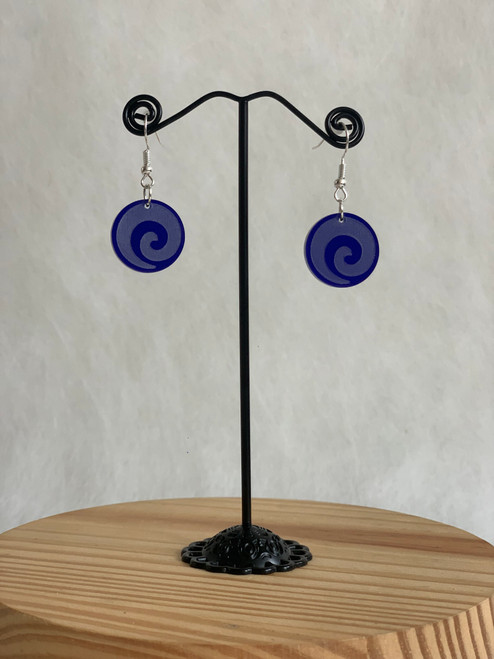 Koru engraved round blue tint acrylic earrings on hook