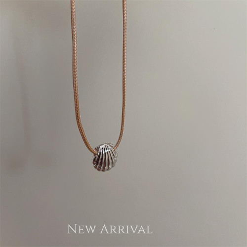 Brown braided rope necklace with silver shell