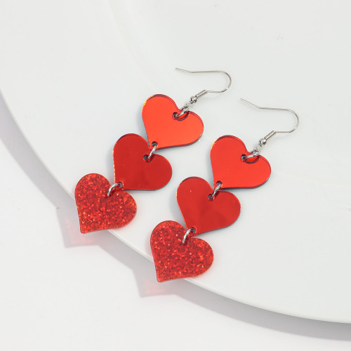 drop of 3 red tone heart earrings on hooks