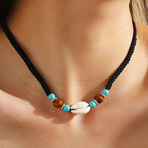 Shell and bead necklace on braided cord