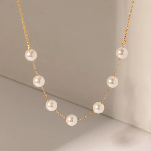 Faux pearl necklace on 18k gold plated chain