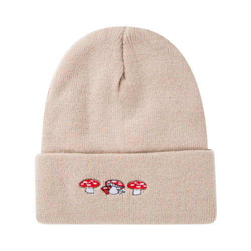 Beige beanie with embroidered mushrooms