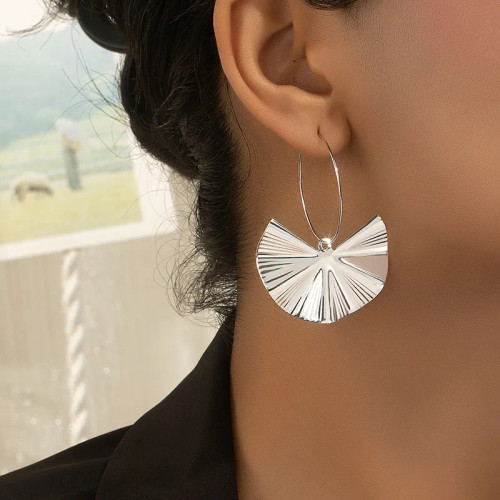 Gingko leafstyle silver coloured earrings on hoops