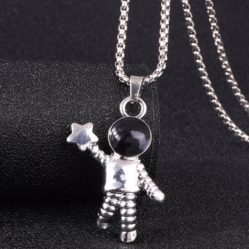 Astronaut pendant on long chain necklace