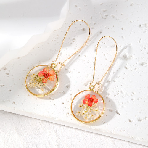 Pink and white dried flower resin drop earrings on long hoop clasp