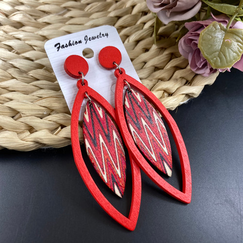 Wooden leaf shape drop earrings on studs - red with zig zag pattern