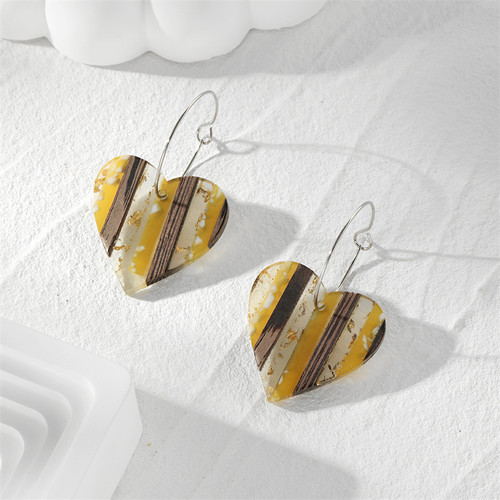 Resin and wood hearts on wire loop findings - yellow