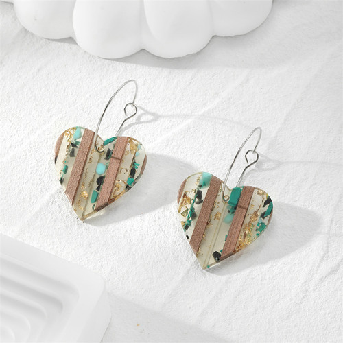 Resin and wood hearts on wire loop findings - teal