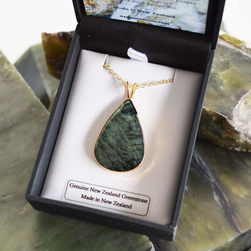 New Zealand greenstone teardrop shaped pendant with gold plating