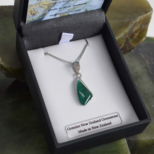 New Zealand small angled greenstone pendant with silver plating on necklace