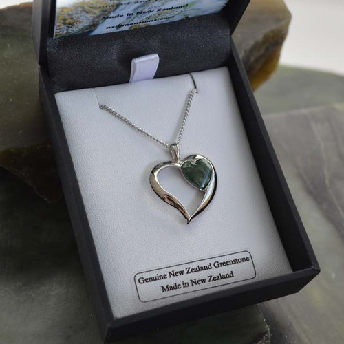 New Zealand greenstone heart with silver plated cut out heart pendant