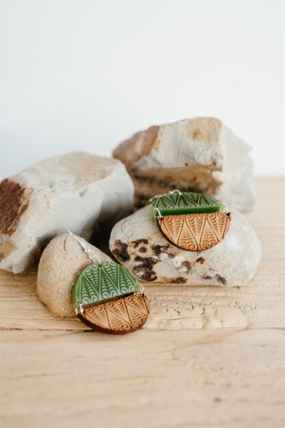 SONZ kōwhaiwhai circle earrings combining green acrylic and wood on hooks