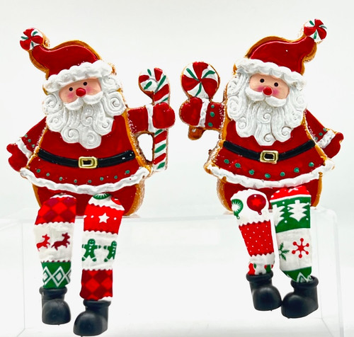 Gingerbread santa shelf sitter holding lollipop