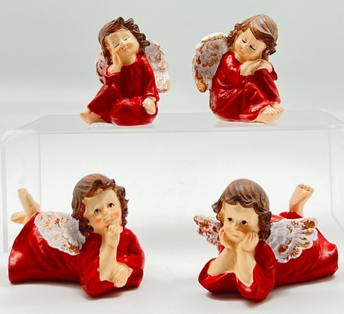 Assorted angels in red figurines