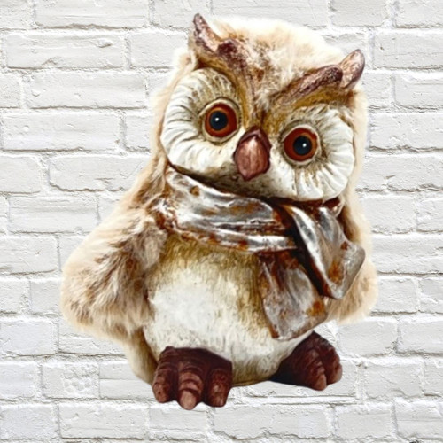 Ornamental owl with faux fur as feathers
