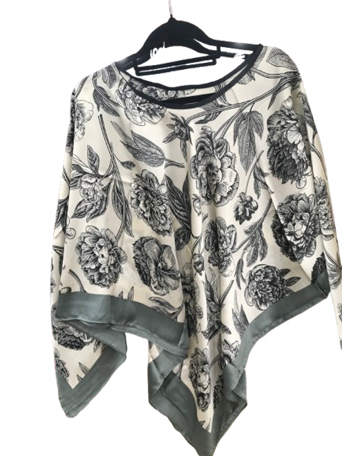 Summerweight poncho - cream and black floral design with sage green border Summerweight poncho - cream and black floral design with sage green border