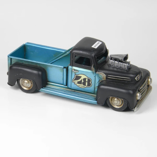 retro style metal ornament of a black and blue pick up truck
