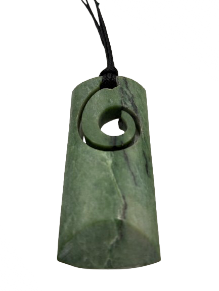 NZ greenstone toki (adze) with cut out koru design