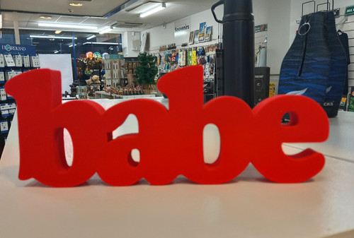 velvet finish free standing "Babe" sign in red