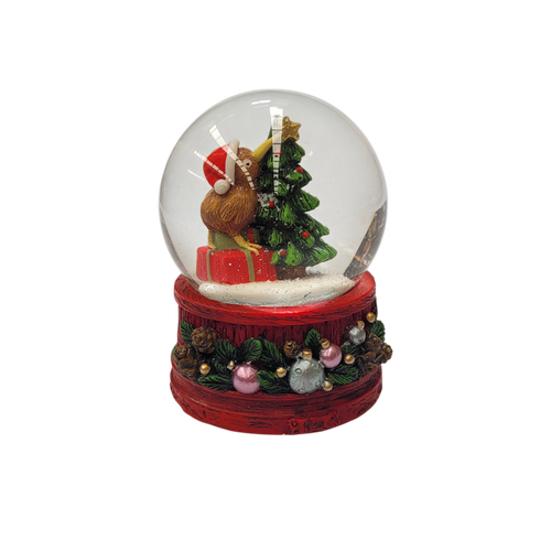 Kiwi wearing Santa hat on presents beside Christmas tree 65mm snow globe